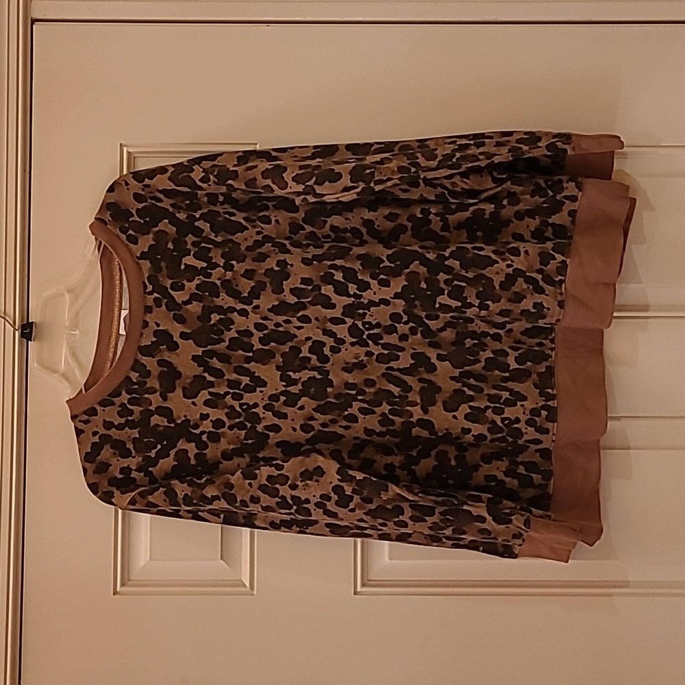 Stars above leopard print top
